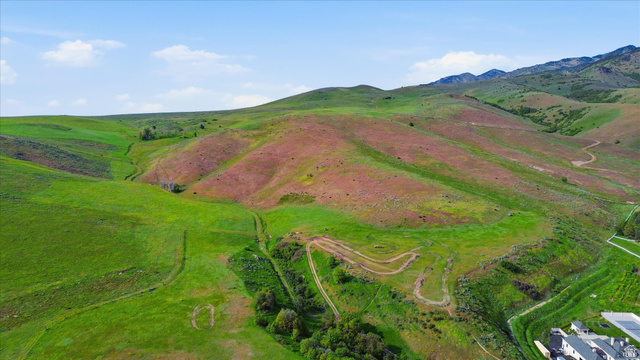2075 Canyon Road Smithfield, UT 84335 - Photo 6 of 18 Expansive green hillsides featuring varied terrain