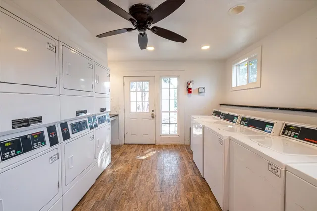 a view of a chairs and table in the patio