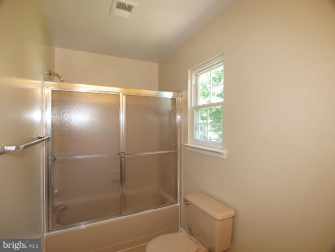 1167 Kersey Road Silver Spring, MD 20902 - Photo 12 of 25 a bathroom with a shower and toilet