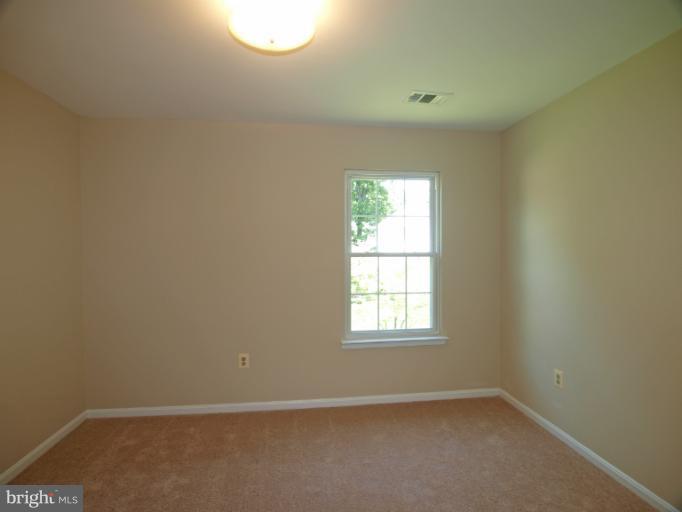 1167 Kersey Road Silver Spring, MD 20902 - Photo 15 of 25 an empty room with a window