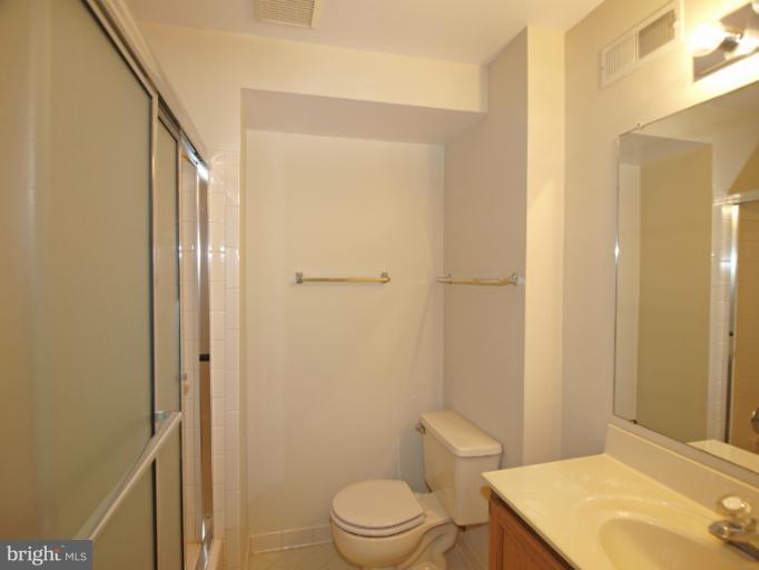 1167 Kersey Road Silver Spring, MD 20902 - Photo 20 of 25 a bathroom with a toilet a sink and shower
