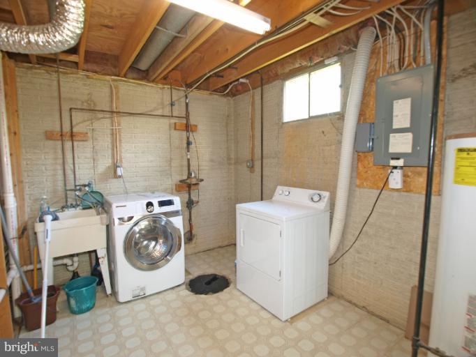 1167 Kersey Road Silver Spring, MD 20902 - Photo 21 of 25 a utility room with dryer and washer