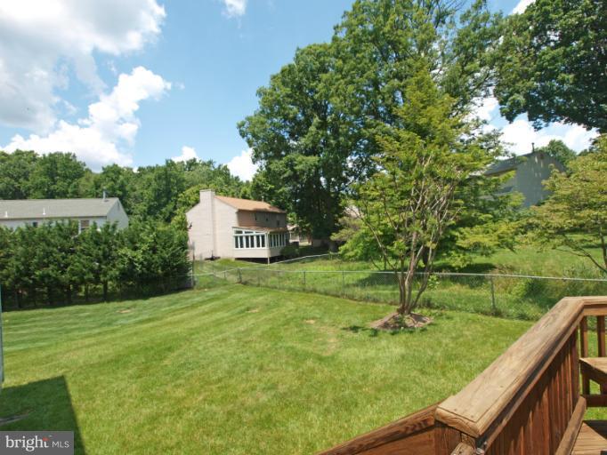 1167 Kersey Road Silver Spring, MD 20902 - Photo 23 of 25 a backyard of a house with lots of green space