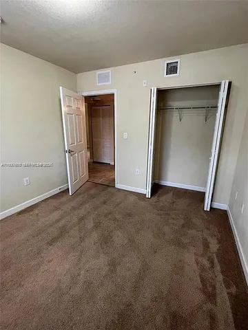 an empty room with closet