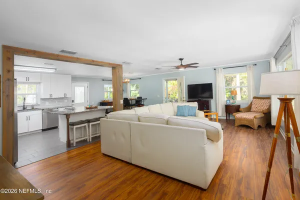 a view of a dining room with furniture and window