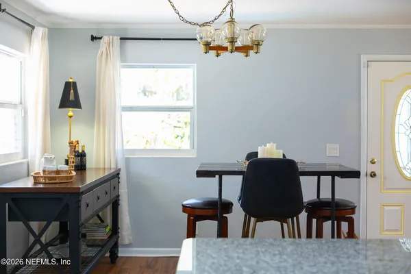 a kitchen with a stove and a shower
