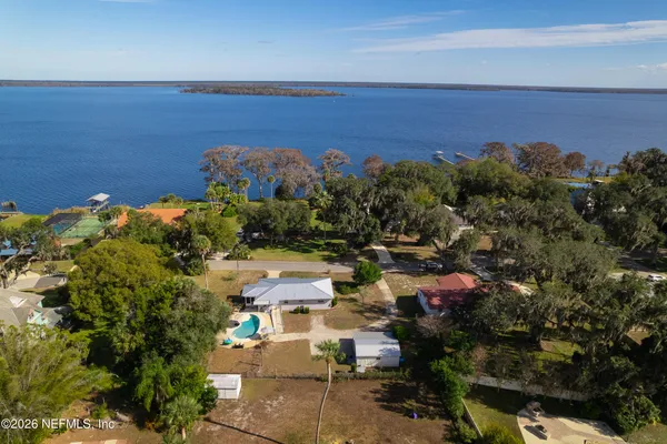a view of a house with swimming pool