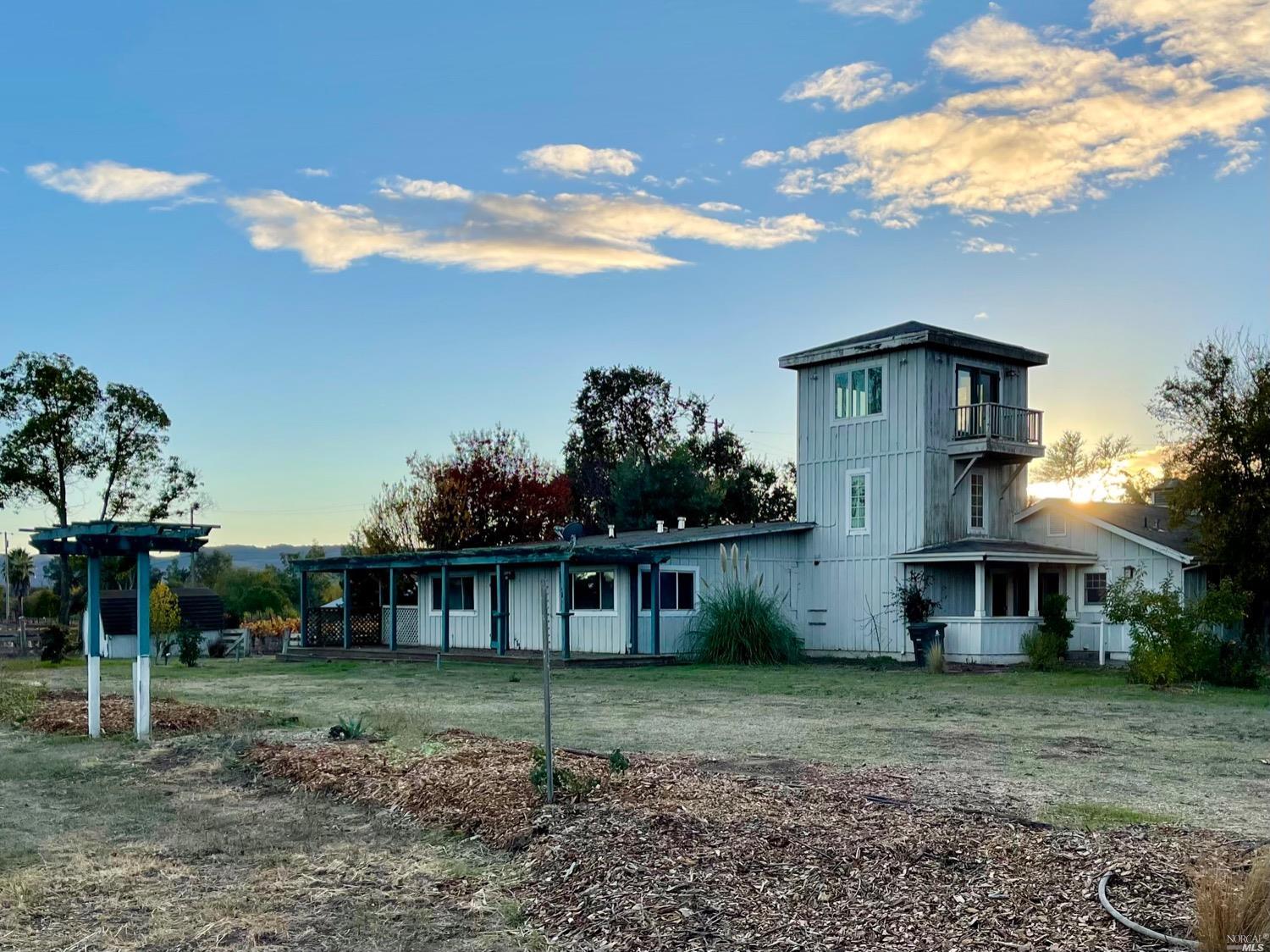 21704 Splude Road Sonoma, CA 95476 - Photo 1 of 1 a front view of a house with a yard