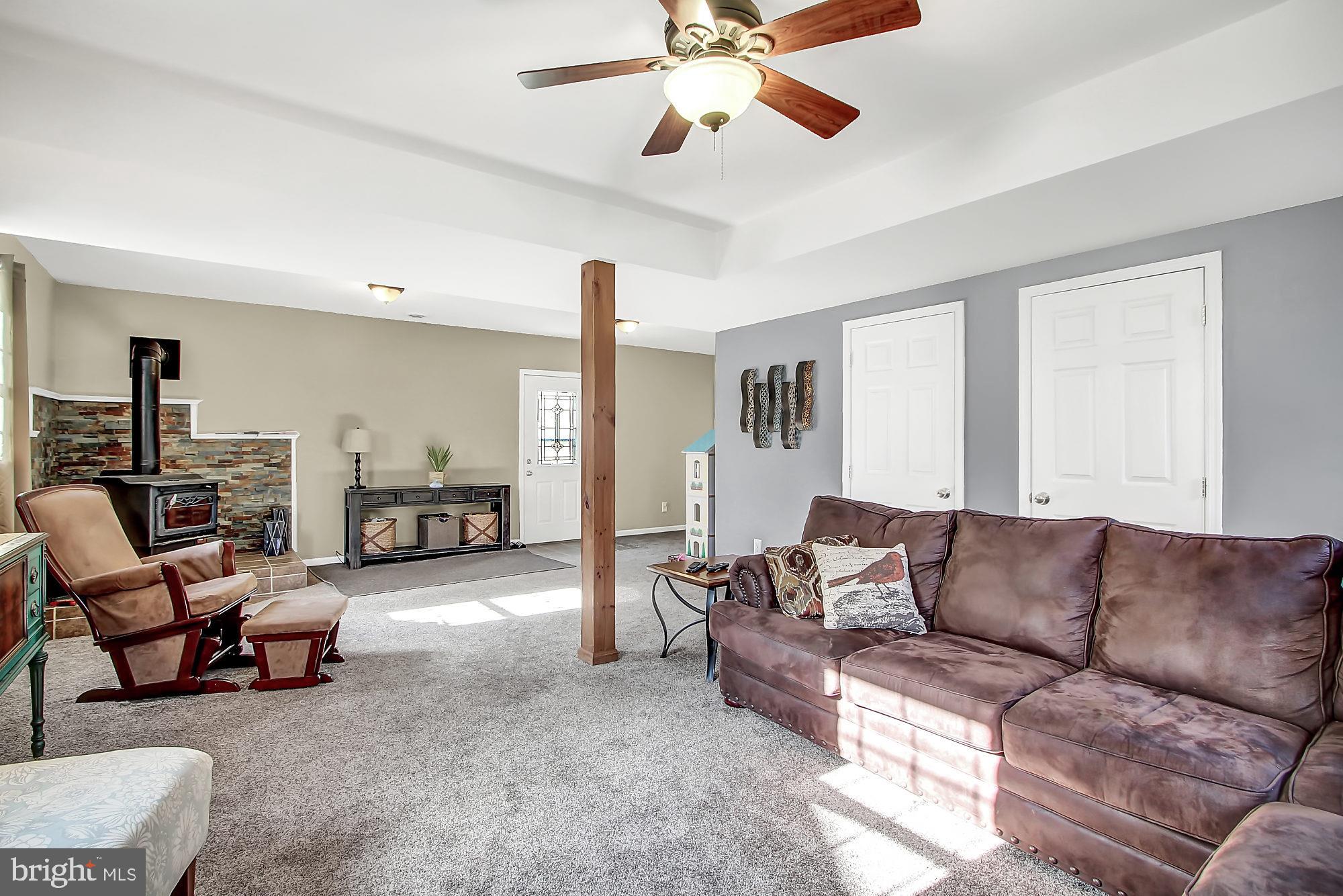 116 Revelation Road North East, MD 21901 - Photo 22 of 27 Lower Level Family with wood burning wood stove an