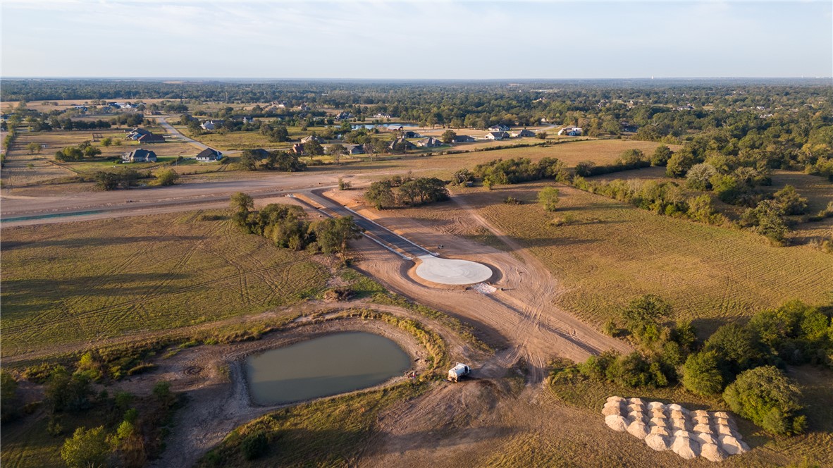 10172 Panther Creek Road Iola, TX 77861 - Photo 21 of 50 an aerial view of a swimming pool and mountain view in back
