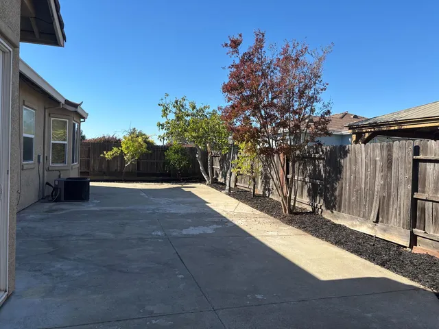 a view of a back yard of the house