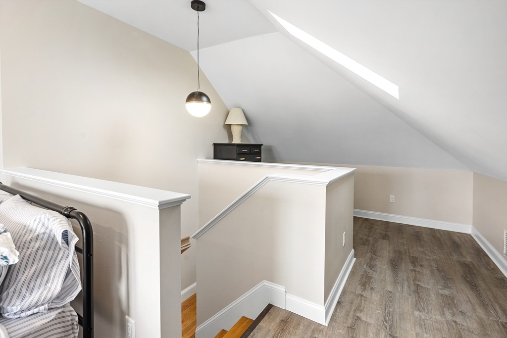 242 Atlantic Avenue, Unit 2 Hull, MA 02045 - Photo 17 of 21 a view of walk in closet with clothes and shoes