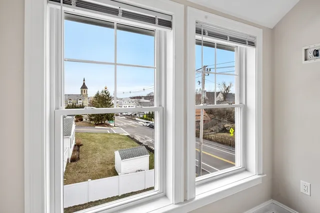 a view of a living room and a window