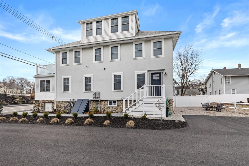 242 Atlantic Avenue, Unit 2 Hull, MA 02045 - Photo 2 of 21 a view of a blue house