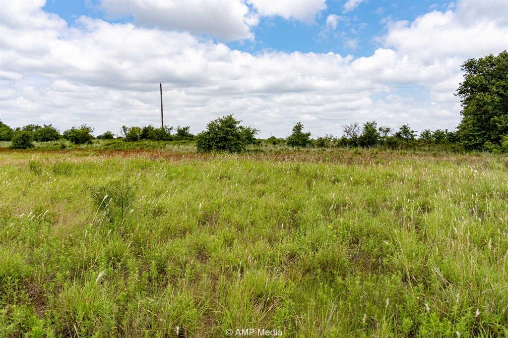 3255 Farm To Market 604 Clyde, TX 79510 - Photo 14 of 36 a view of a lake from a yard
