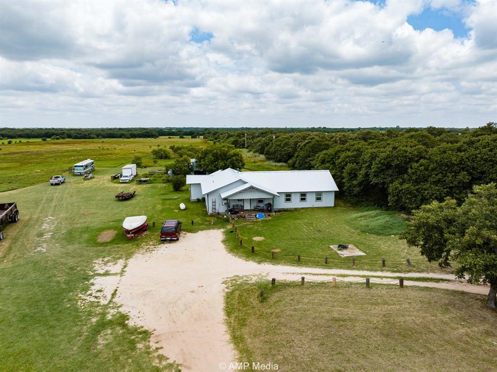 3255 Farm To Market 604 Clyde, TX 79510 - Photo 19 of 36 an aerial view of a house with a garden