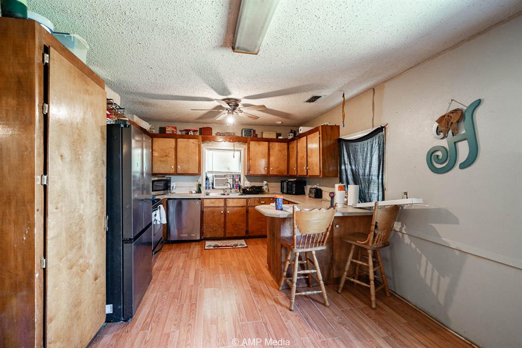 3255 Farm To Market 604 Clyde, TX 79510 - Photo 33 of 36 a view of a kitchen and dining room