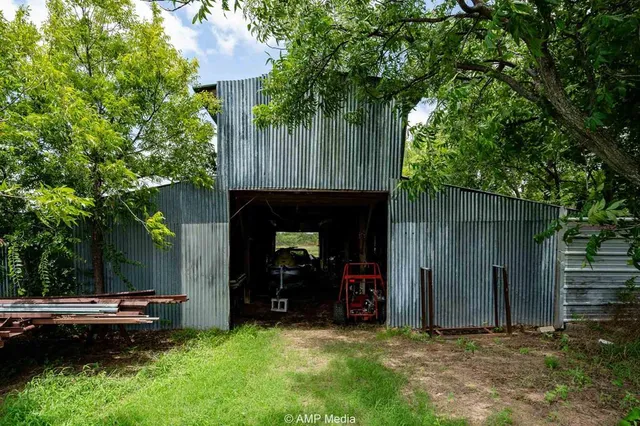 a view of a yard and mountain