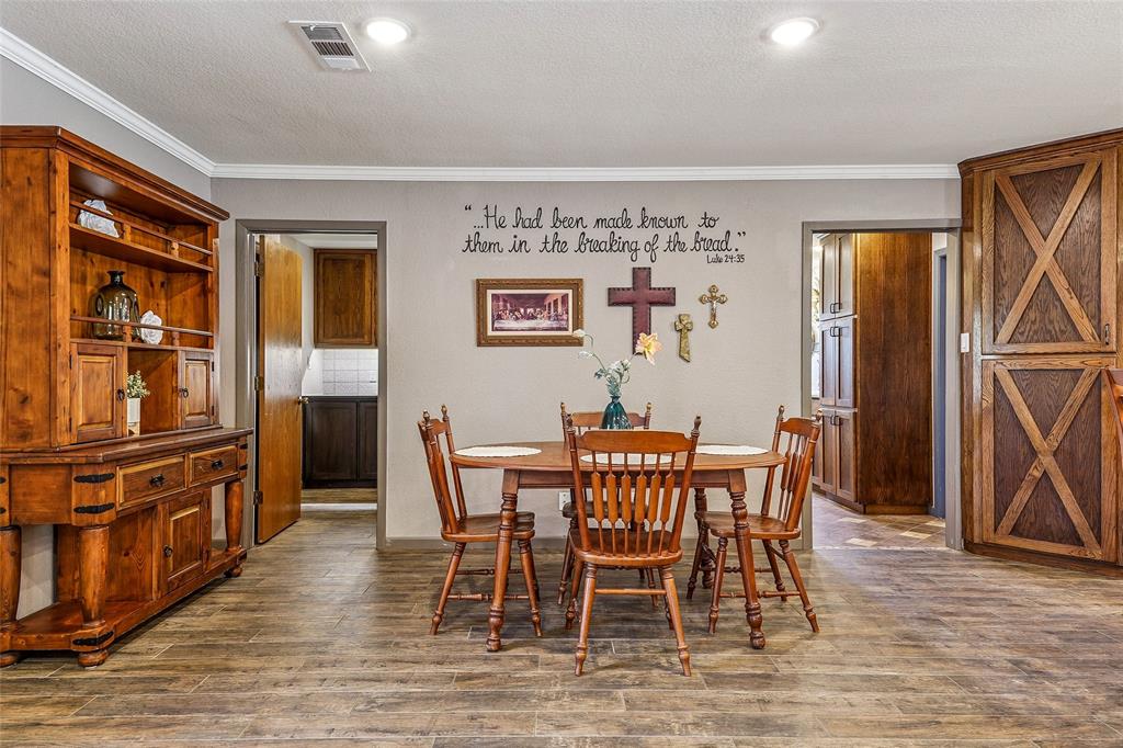 908 North Maple Street Muenster, TX 76252 - Photo 13 of 40 a view of a dining room with furniture and a window
