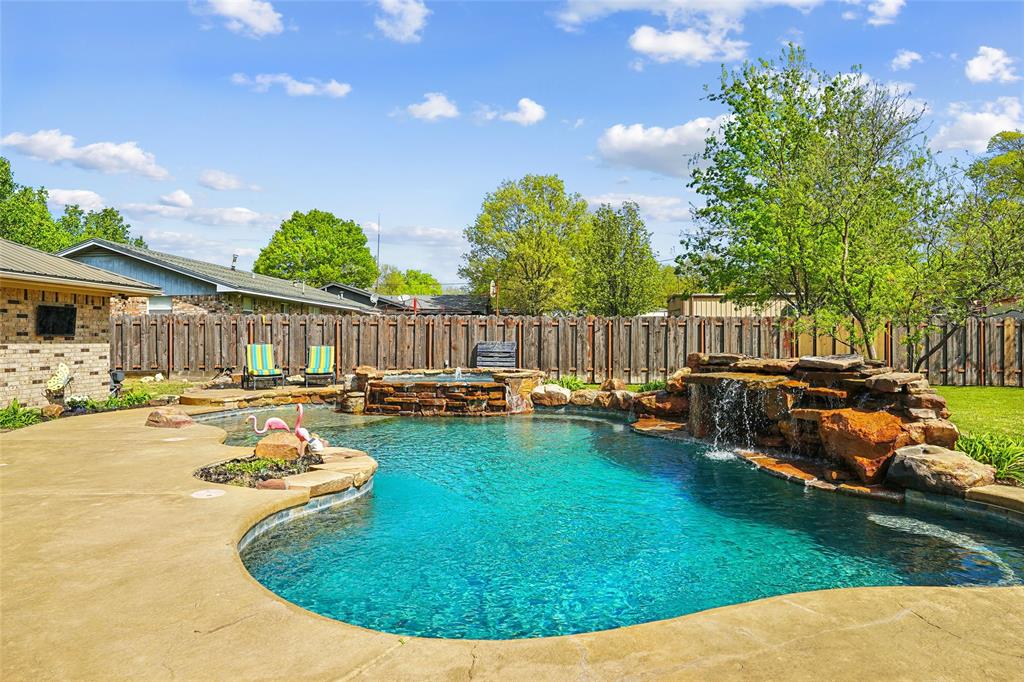 908 North Maple Street Muenster, TX 76252 - Photo 24 of 40 a swimming pool with outdoor seating and yard