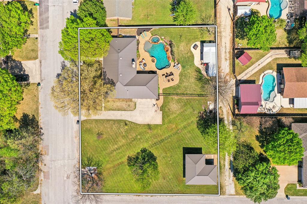 908 North Maple Street Muenster, TX 76252 - Photo 36 of 40 an aerial view of residential house with outdoor space and swimming pool