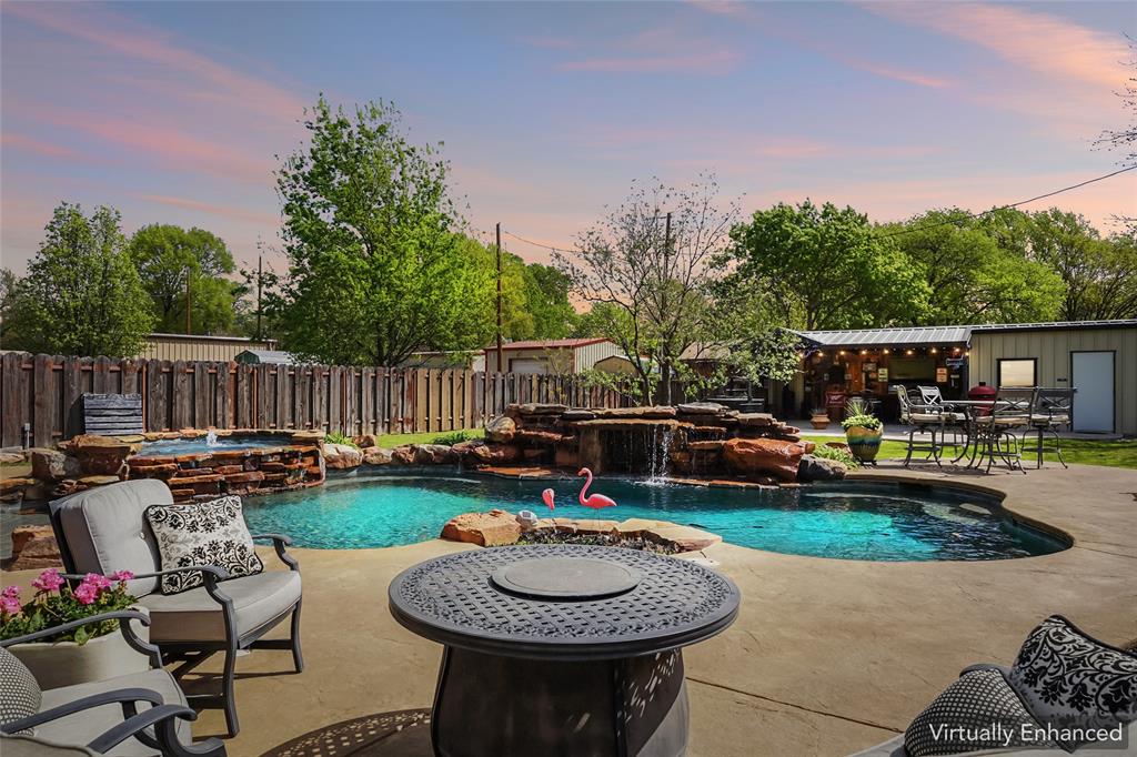 908 North Maple Street Muenster, TX 76252 - Photo 39 of 40 a view of an house with backyard and furniture