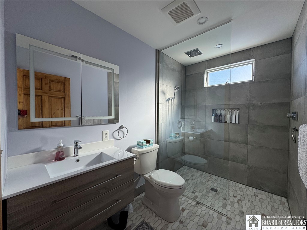 29 Loomis Bay Road Busti, NY 14710 - Photo 26 of 50 The main bathroom is ready for everyday convenienc