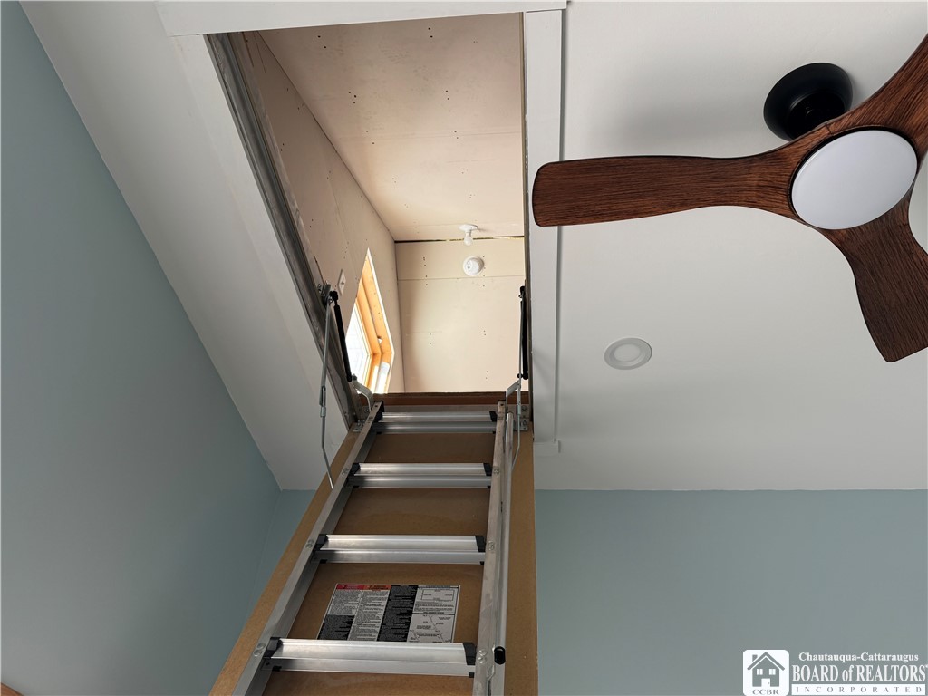 29 Loomis Bay Road Busti, NY 14710 - Photo 38 of 49 The fold-up staircase to the attic area is perfect