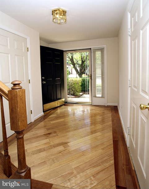 12846 Silvia Loop Woodbridge, VA 22192 - Photo 4 of 30 a view of an entryway with wooden floor