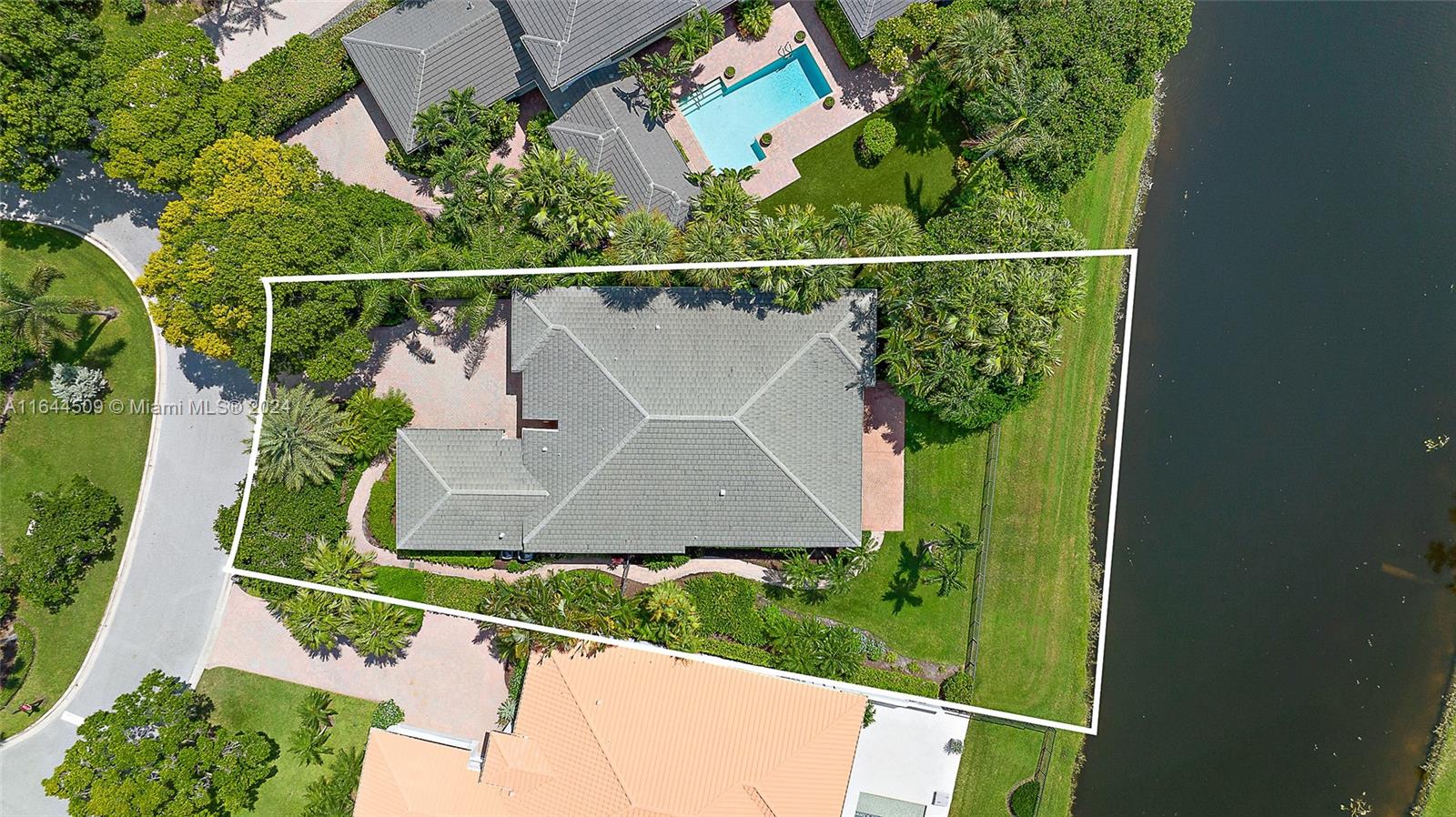 167 North Village Way Jupiter, FL 33458 - Photo 2 of 18 an aerial view of a house with pool outdoor seating and entertaining space