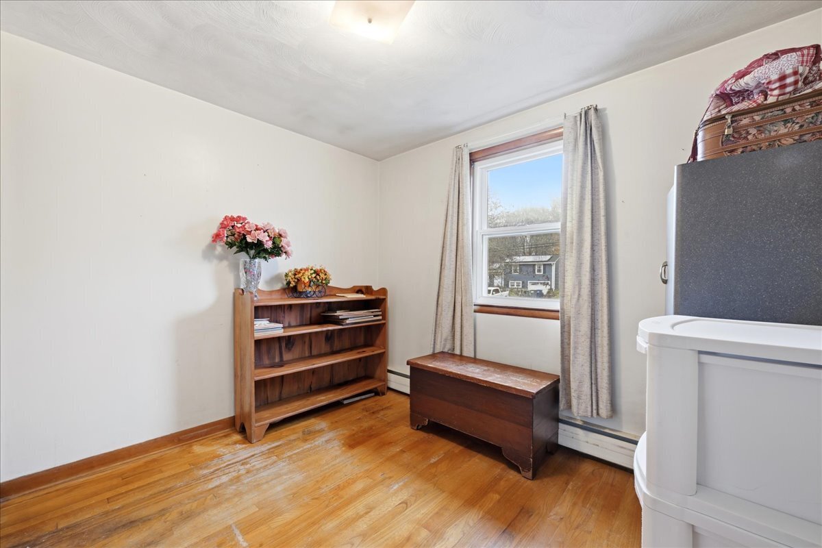 7 Barn Road Ledyard, CT 06339 - Photo 19 of 26 a view of room with toys and wooden floor