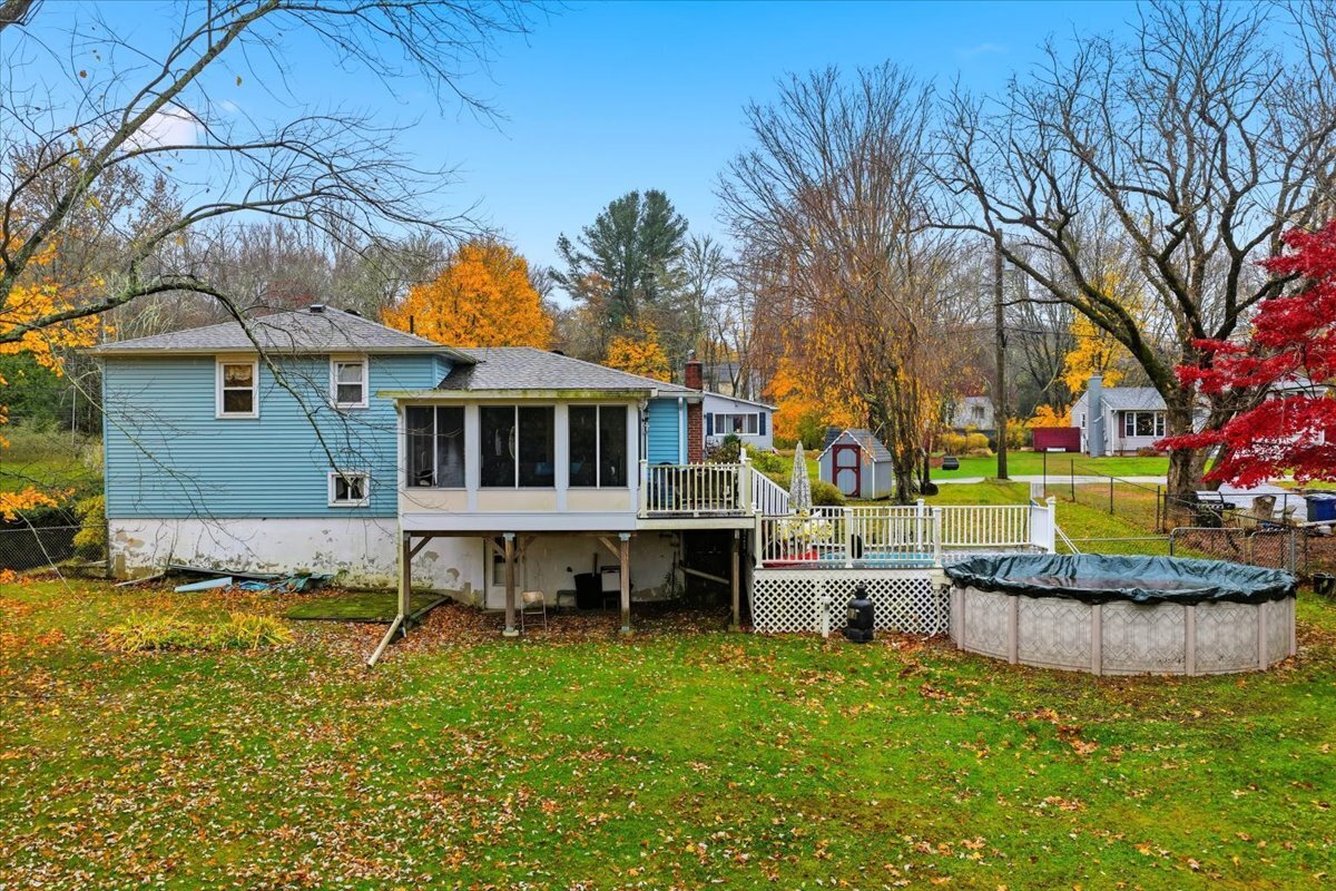 7 Barn Road Ledyard, CT 06339 - Photo 25 of 26 a house that has a lot of plants and large trees