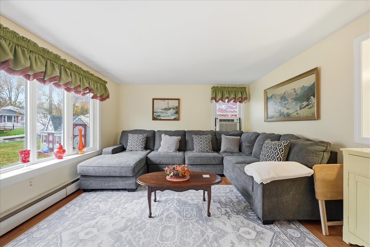 7 Barn Road Ledyard, CT 06339 - Photo 6 of 26 a living room with furniture and a window