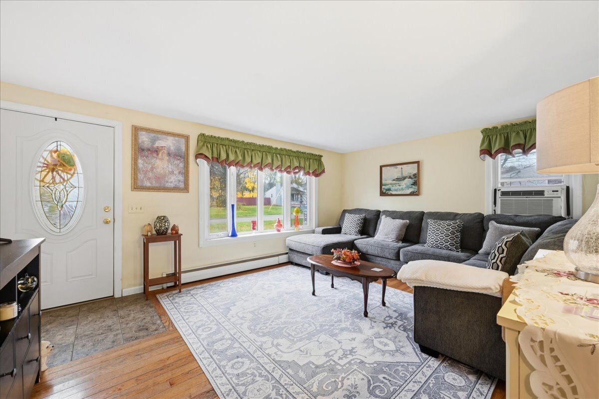 7 Barn Road Ledyard, CT 06339 - Photo 7 of 26 a living room with furniture and a window