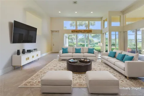 a view of a livingroom with furniture and a fireplace