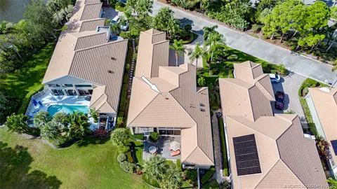 a view of a ocean with a building in the background