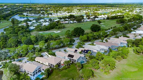 a view of a dinning table and chairs in the patio