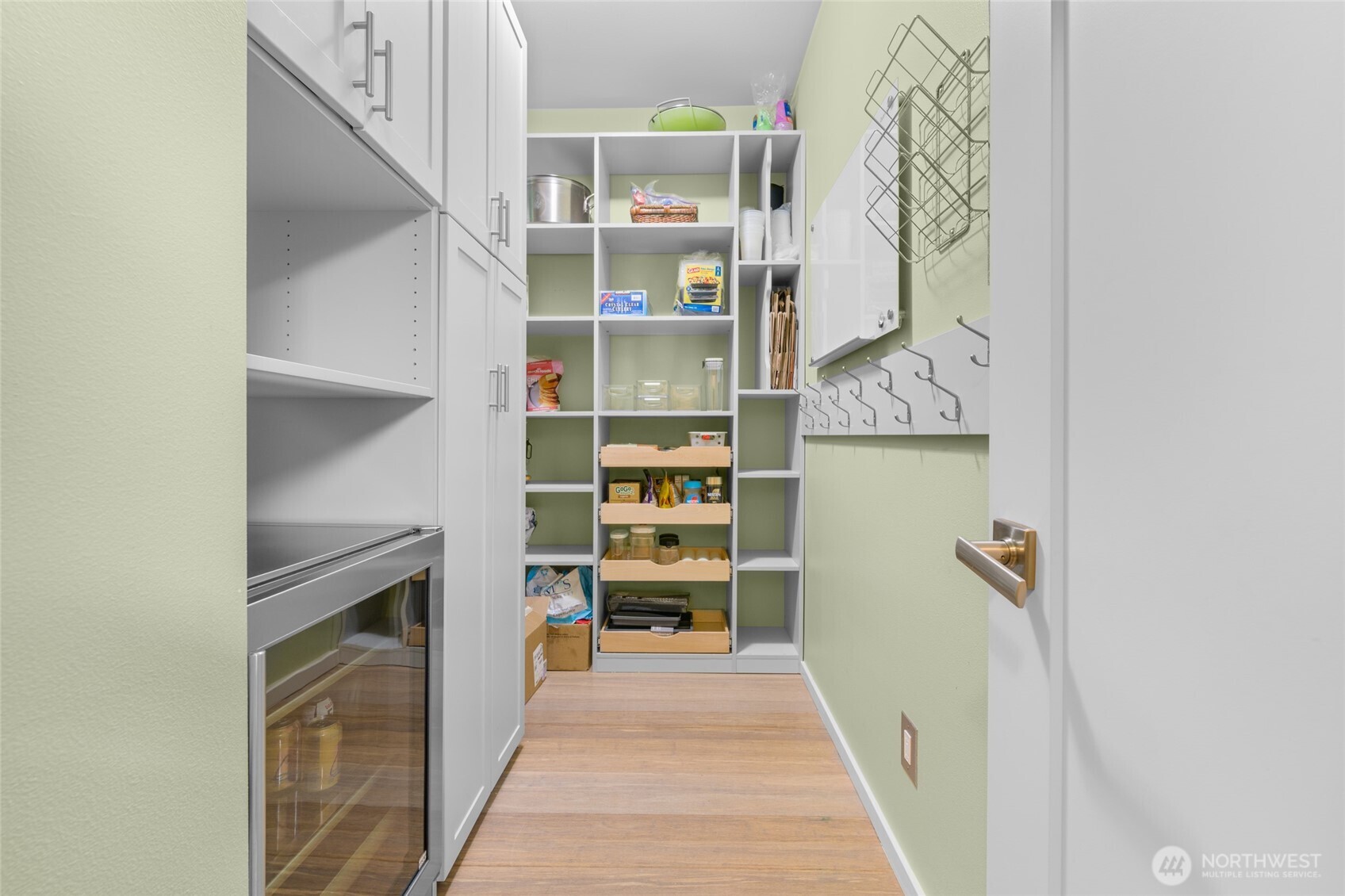 22326 2nd Place Southeast Bothell, WA 98021 - Photo 12 of 40 a view of a hallway with wooden floor and closet