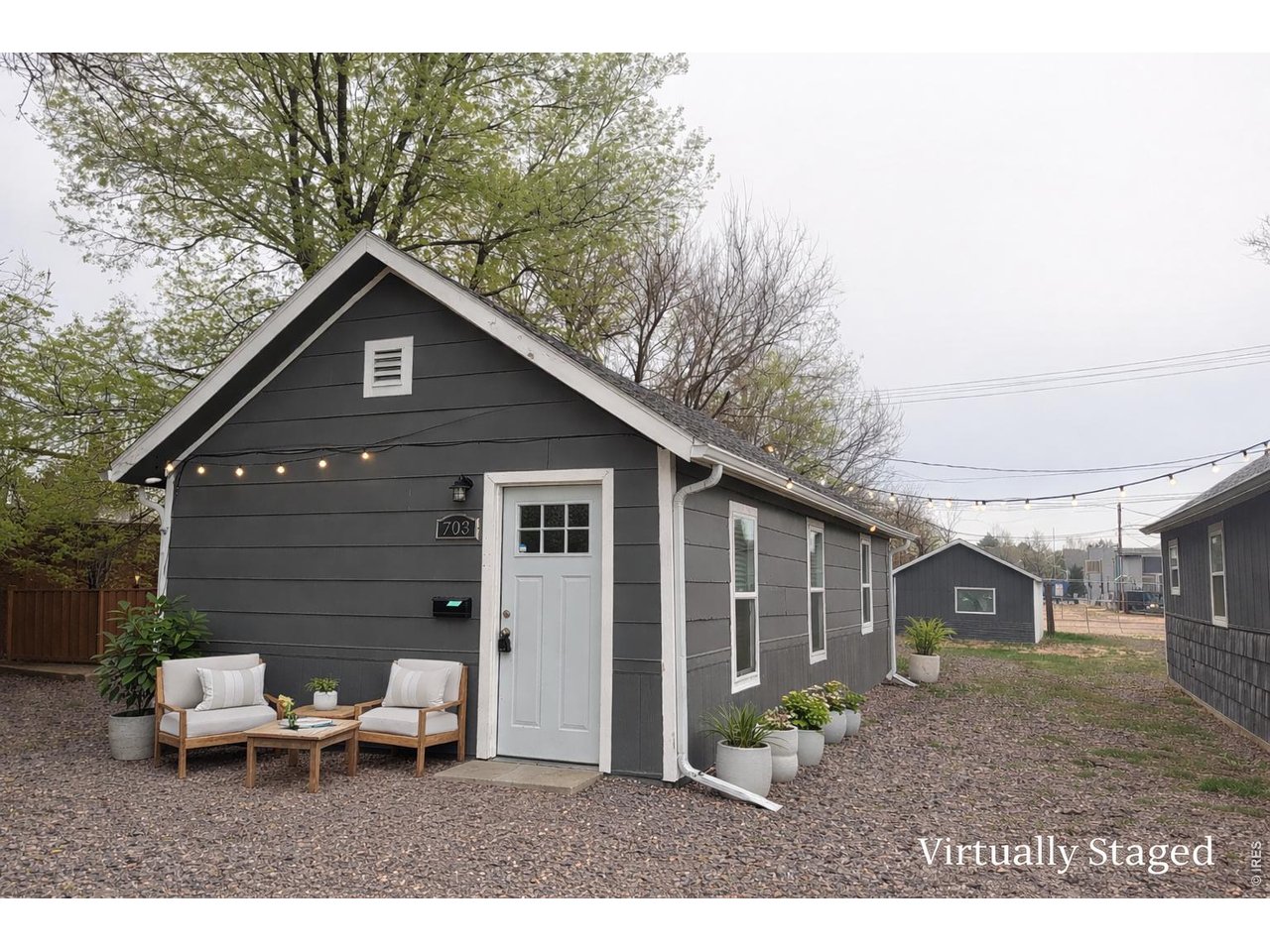 703 North 2nd Street Sterling, CO 80751 - Photo 11 of 19 a view of a house with yard and a patio