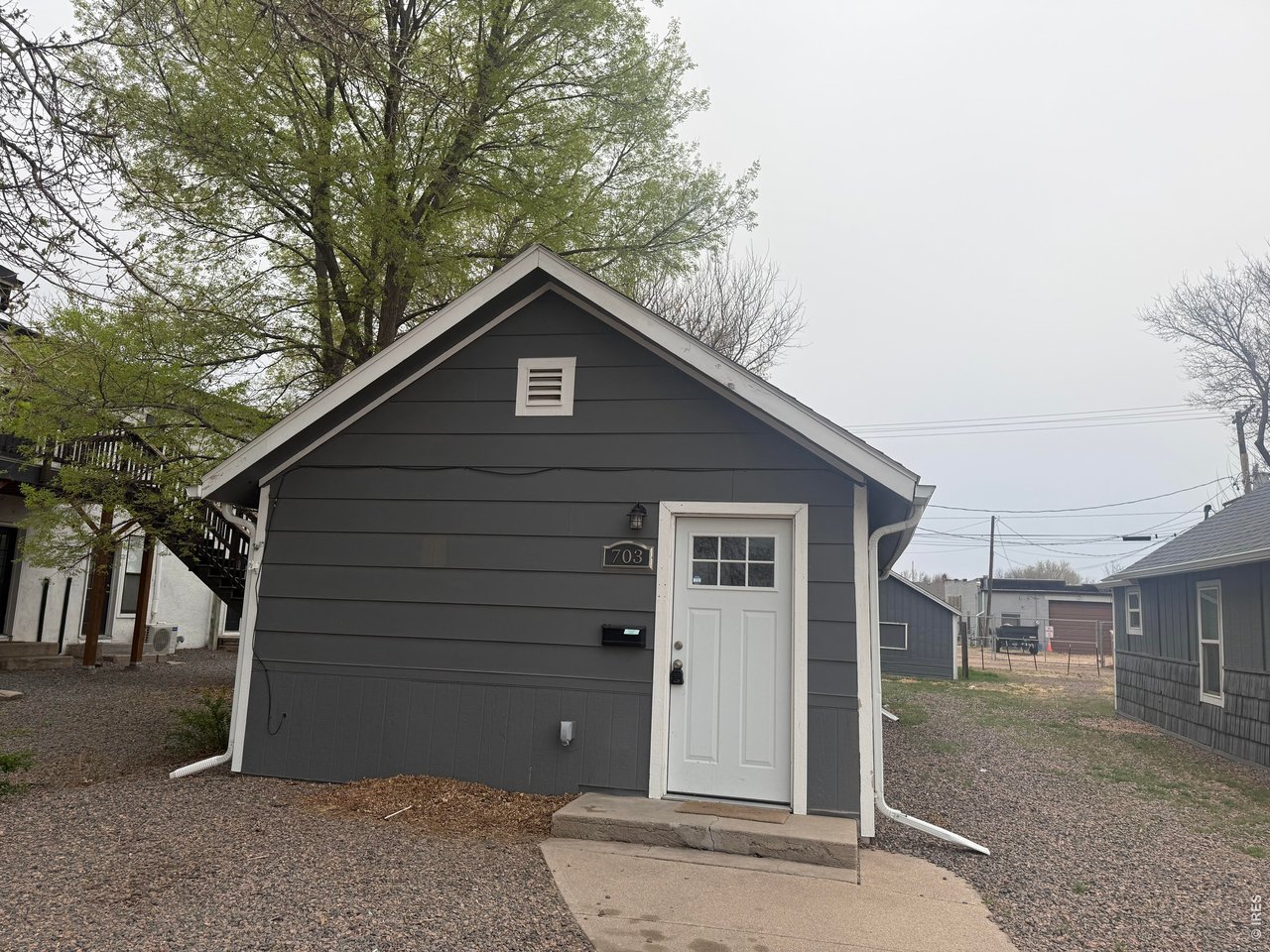 703 North 2nd Street Sterling, CO 80751 - Photo 17 of 19 a view of a house with a yard