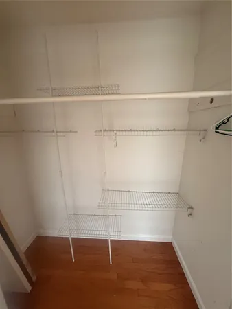 a view of a room with racks on the wall