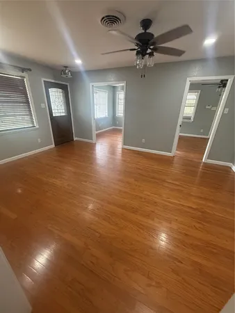 a view of an empty room and window