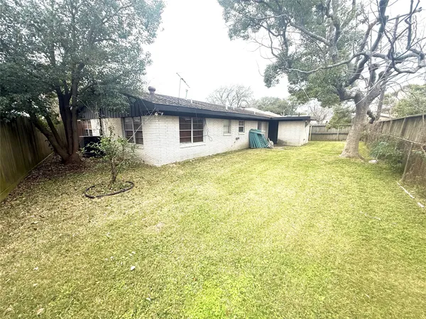 a house view with a outdoor space
