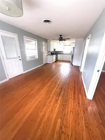 a view of livingroom with furniture and wooden floor