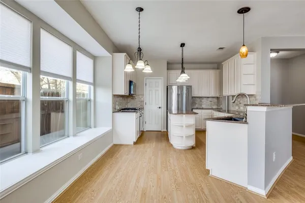 a large kitchen with a lot of counter space