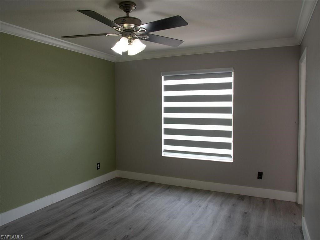 2822 Inlet Cove Lane West Naples, FL 34120 - Photo 17 of 23 a view of an empty room with a window