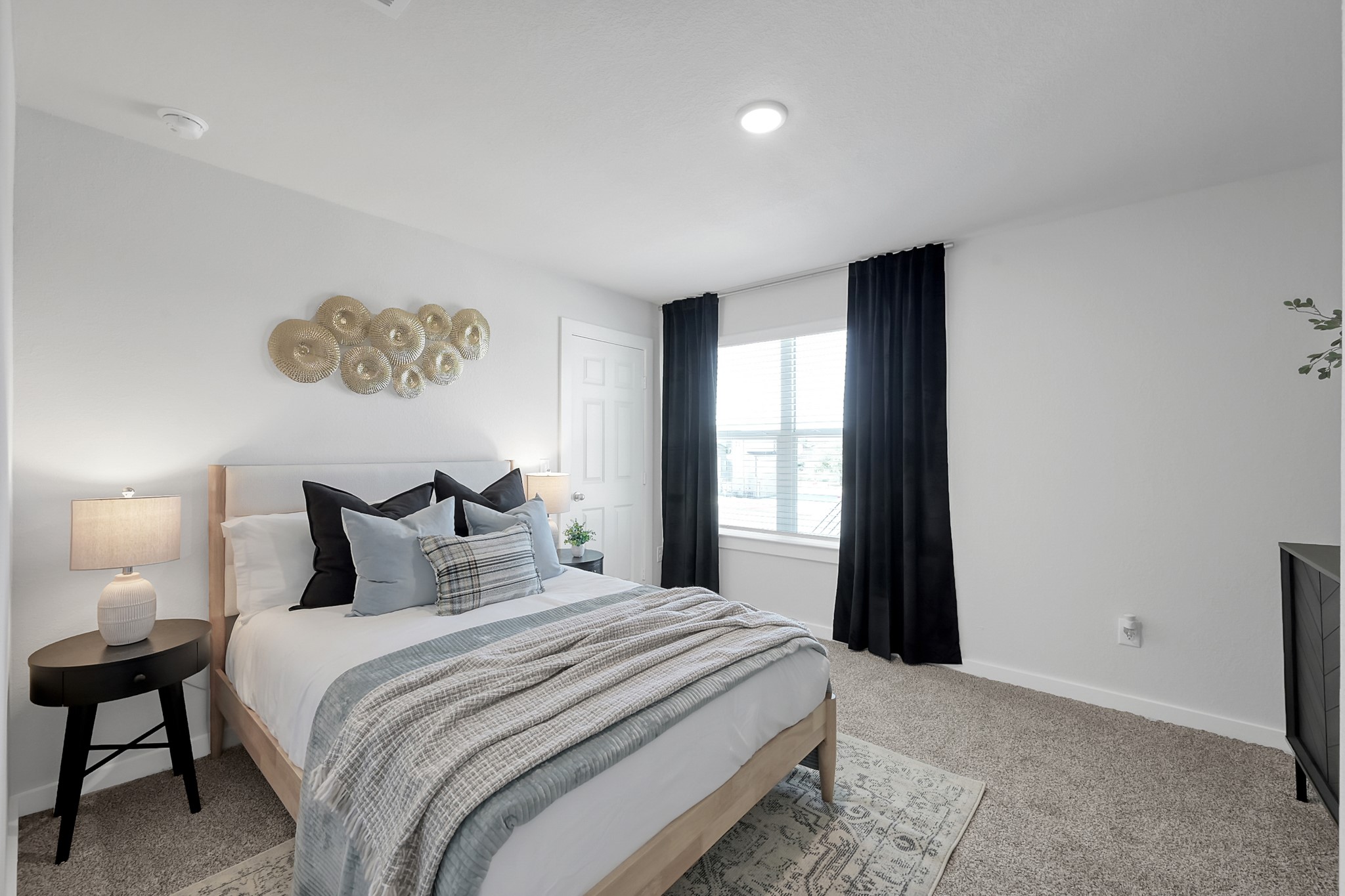 3450 Barker Cypress Road, Unit 2205 Houston, TX 77084 - Photo 14 of 21 a bedroom with a bed and a window