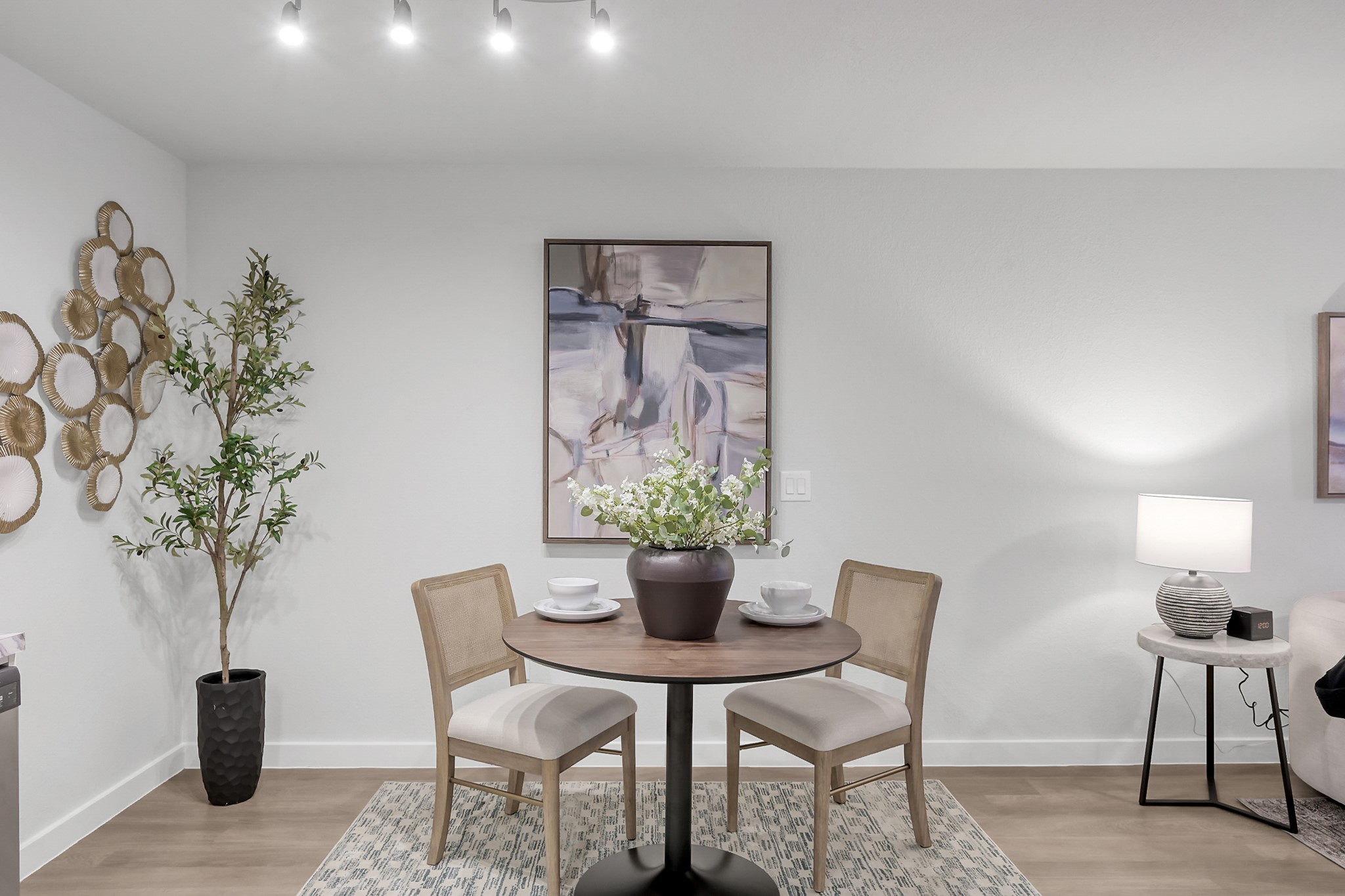 3450 Barker Cypress Road, Unit 2205 Houston, TX 77084 - Photo 9 of 21 a dining room with furniture and chandelier