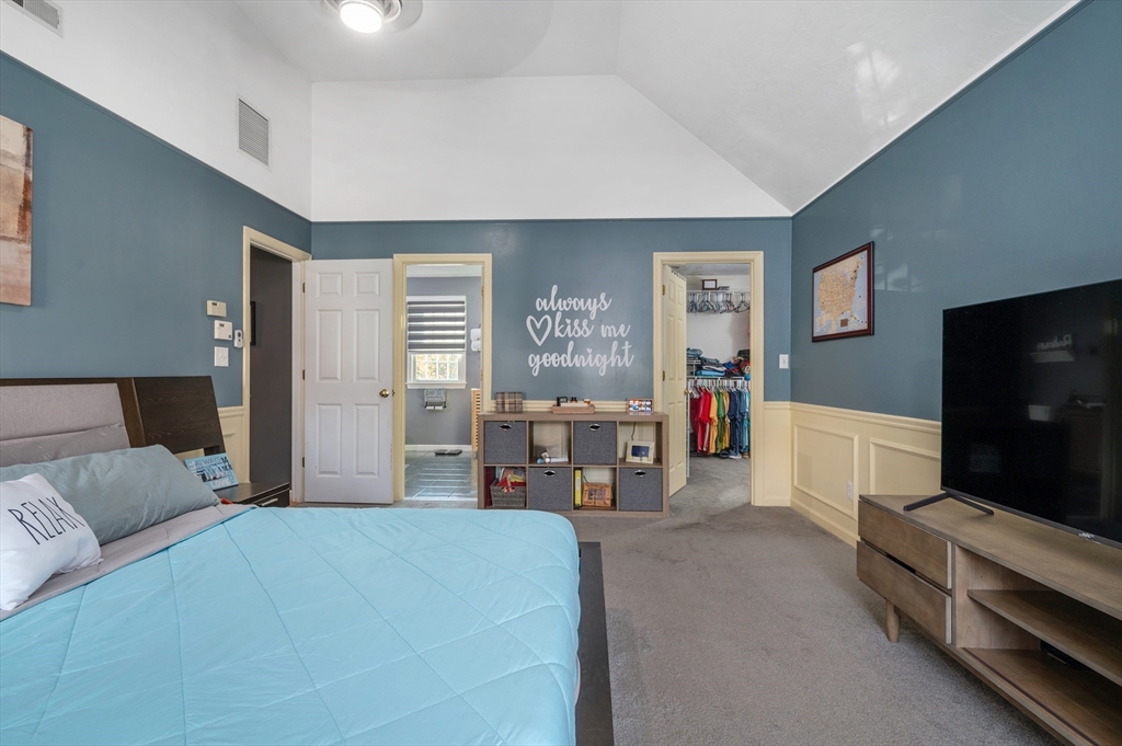 4 Horseneck Road Shrewsbury, MA 01545 - Photo 17 of 33 a bedroom with furniture and a flat screen tv