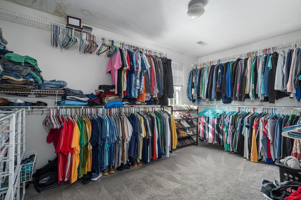 4 Horseneck Road Shrewsbury, MA 01545 - Photo 19 of 33 a view of walk in closet with clothes